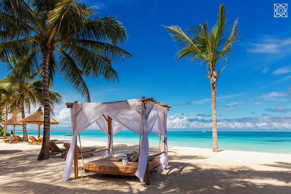 Pristine white sand beach and turquoise water in Zanzibar